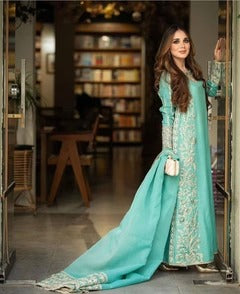 Serene Turquoise Khaddi Silk Ensemble - back view - Pakistani Women's Suit | Alif Clothings